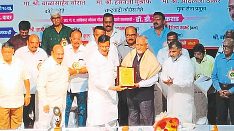 Nashik: While felicitating Dr. Vikrant Jadhav for getting the first prize for his thesis 'Ayurvedic Medicine through Telemedicine' at the World Ayurveda Congress in Goa on Tuesday, the president of the library Prof. Dilip Phadke. Along with library officials.