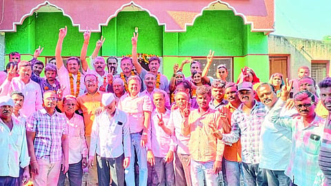 Sarpanch Chandrakant Aher and his supporters cheering after winning the village panchayat elections in Satwaiwadi (Devla).
