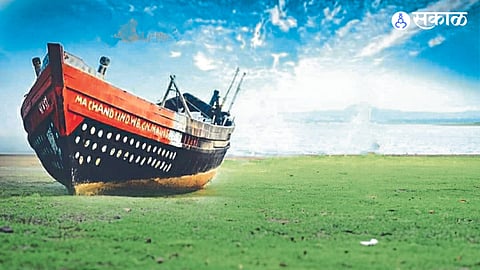 an attractive fishing boat on the bank of Chankapur Dam.