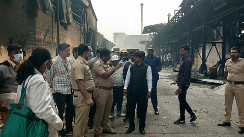 Deputy Superintendent of Police Arjun Bhosle, Assistant Inspector Dilip Khedkar along with company officials while informing MP Hemant Godse.