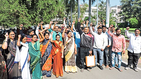 Civilian contract employees agitating for various demands.