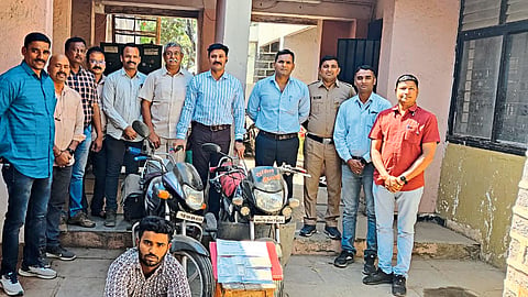 Police team with seized material from arrested Ishtiaq Ali