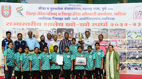 MLA Rahul Dhikle while felicitating the girls who won the school kho kho competition. Along with dignitaries from the field of sports.