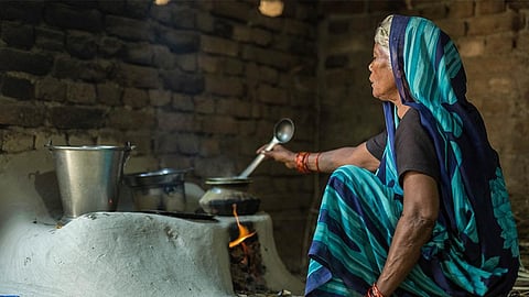 Housewives cooking on the stove as gas is expensive.