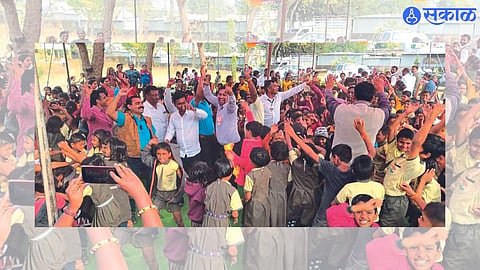 Nandgaon: Group Education Officer Pramod Chinchole and teachers who have contracted to dance with the children at the conclusion of the taluk level president's trophy competition here