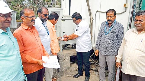 Municipality team while sealing the mobile tower in the city.