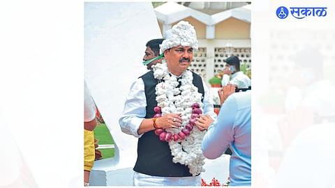 MLA Anil Patil raising his voice regarding onion and cotton crops in the legislature area during the budget session.
