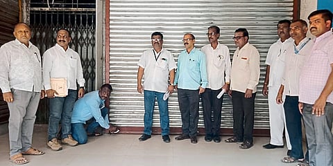Municipal Corporation team sealing Maharashtra Bank office on Wednesday over property tax arrears