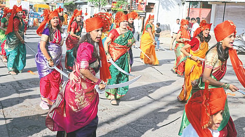 Women performing swords demonstrations during the New Year Swagat Yatra.
