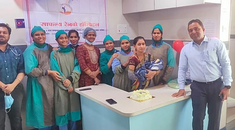 doctors and staff of hospital with baby nashik news 