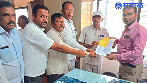 Panditrao Nikam, Satish Somvanshi and others along with Kuber Jadhav while filing nomination form from society group for market committee election.