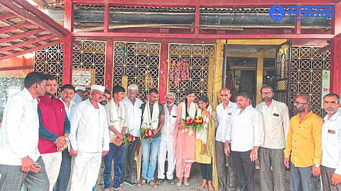 Sarpanch Namdev Shinde congratulating Bhumiputra Saadhan Dond, Santosh Shinde, Archana Shinde, Sonali Shinde on their selection in the police force.
