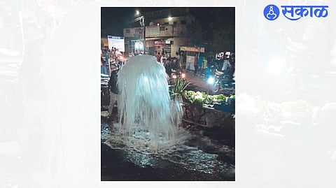 A water fountain bursts in front of Ashok Kirana in Mehrun
