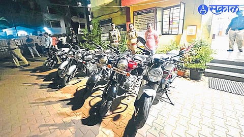 Satara police with the 40 seized modified silencers in a special traffic campaign aimed at controlling noise pollution.