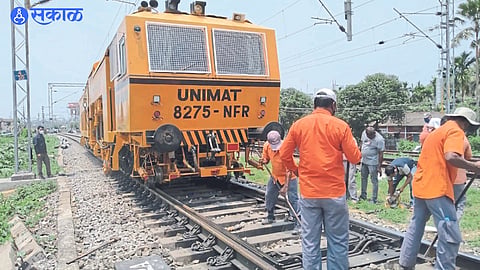 Workers repairing fractures in railway tracks.

