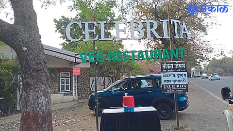 A board placed at the entrance of Hotel Celebrita on the Nashik-Pune highway.
