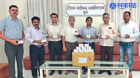IMA officials while handing over the stock of anti-tuberculosis drugs to municipal officials
