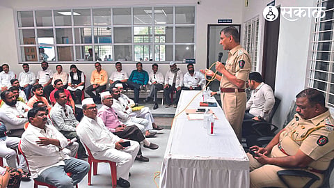 Niphad Sub Divisional Police Officer Somnath Tambe, Tehsildar Eknath Bangale speaking at the peace committee meeting.
