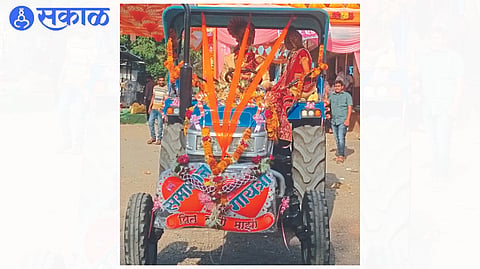 Groom Samadhan Mahajan with  bride on tractor