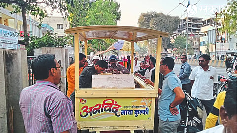 Crowd of customers at the Kulfi selling cart on Camp Road in Malegaon