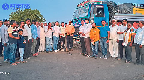 Officials and villagers at the inauguration of the canal's recharge shaft work.
