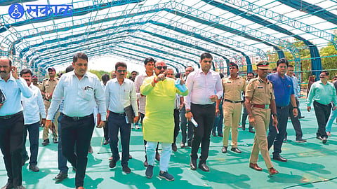 Guardian Minister Gulabrao Patil while inspecting the place of executive committee on the police drill ground.
