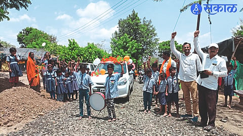 A procession of students in decorated cars at the school in Wadi Choulher.