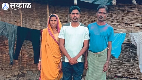 Kailas Pawara with his parents 