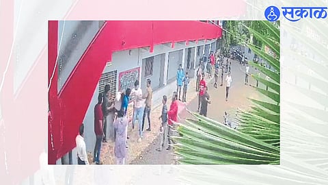 Suspect Kishore Suryavanshi assaulting a teacher in the premises of AGC English Medium School.
