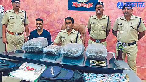 Police inspectors and staff with seized ganja at Railway Security Force office.
