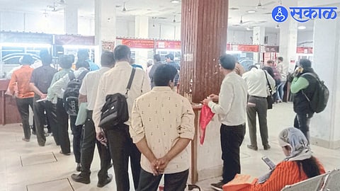 Crowd at post office counter for Rakhi parcels
