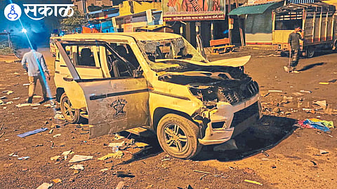 Damage to Deputy Superintendent of Police's vehicle.

