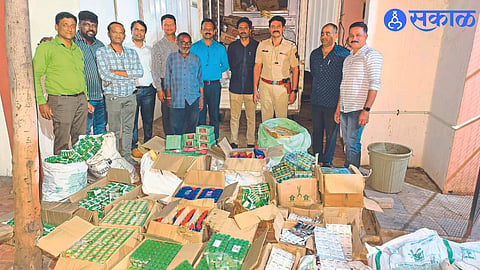 Police inspector Jaipal Hire and team along with fake goods seized from Jayaprakash Dara and Akash Balani on Wednesday.