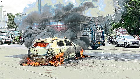In jalna protest against police lathi charge sarpanch of Phulumbri taluk burnt his own new car 