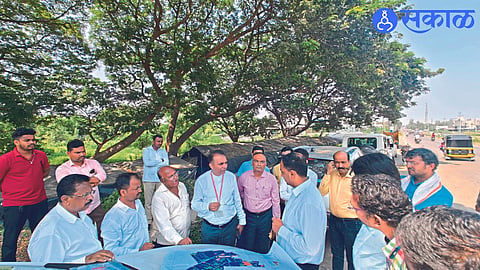 Collector Ayush Prasad and Delhi officials discussing the site for ESIC hospital on Saturday with a map.