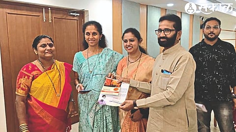 Laxman Mandala, Anita Damle, Madhuri Ohol of the Nationalist Sharad Pawar group while presenting Tuljabhawani Mata's kunku to MP Supriya Sule.