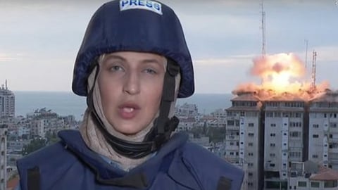  israel missile strikes palestine tower behind reporter live on Air video goes viral  Israel Palestine Conflict  