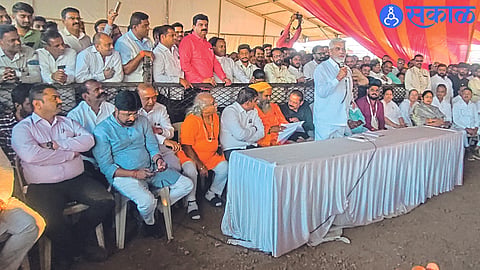 Guardian Minister Dada Bhuse while guiding the attendees.