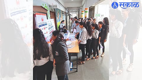 Female students participating in immunization.
