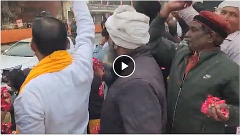 pm modi ayodhya road show iqbal ansari son of babri case litigant hashim ansari showered flowers Video  