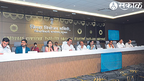 Guardian Minister Anil Patil speaking at the district planning committee meeting at the collector's office.