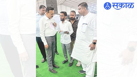 Girish Mahajan reviewing preparations for Prime Minister Narendra Modi's visit. MLAs Rahul Dhikle and Ganesh Gite are neighbors.