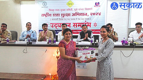 Helmets were distributed to women at the inaugural program of the 34th National Road Safety Campaign