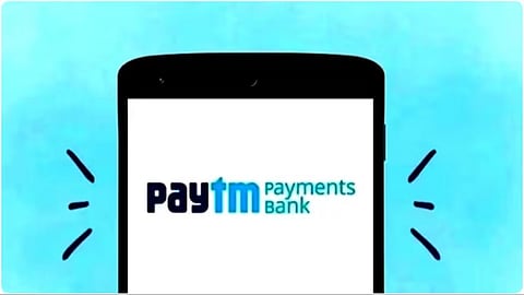 RBI orders Paytm Payments Bank to not onboard new customers No further deposits credit transactions 