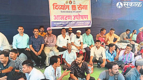 Jalgaon Disabled people protesting in front of Municipal Corporation on Tuesday.