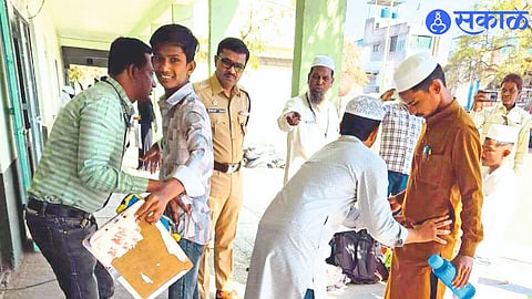 Dhule Shrikant Dhiware present during examination at Jijamata school for 12th examination.