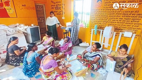 Empowered self-help group women making sanitary pads.
