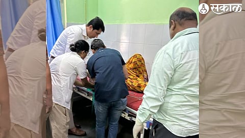 While treating injured patients at Chandwad Rural Hospital, District Surgeon Dr. Charudatta Shinde.