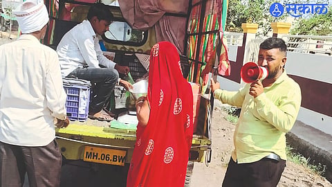 Youth selling fruit from a four-wheeler in rural areas. 