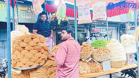 A businessman selling suttarpheni at Mohammad Ali Road in Malegaon.